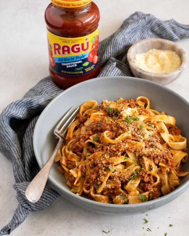 It's time to bring out the sweaters and cook up some comfort food such as this Weeknight Bolognese to warm and nourish the belly as the season cools down. {#ad} Simmer ground beef in RAGÚ® Old World Style® Traditional Sauce made with olive oil, spices and jazz it up with some coconut milk to make a hearty and decadent sauce. RAGÚ Sauce allows you to skillfully and confidently whip up delicious meals the whole family will love, and you’ll think this Weeknight Bolognese has been simmering for hours. Serve on top of fresh, fettuccine noodles for a filling and comforting meal that everyone will want to come back for seconds! @KrogerCo @RalphsGrocery @Ragu #RaguatKroger #Ragu

Weeknight Bolognese Recipe
1 tbsp olive oil 
1 lb ground beef
2 tbsp Italian seasoning 
1 jar RAGÚ Old World Style Traditional Pasta Sauce
1/4 cup coconut milk
cooked fettuccine noodles 
parmesan cheese 
Heat a medium saucepan over medium high heat. Pour olive oil and add ground beef. 
Stir to break the meat in smaller pieces. Sprinkle Italian seasoning and cook until browned.
Pour a jar of RAGÚ Old World Style Traditional Pasta sauce and stir. Let it simmer for 5 minutes. 
Reduce heat to low and cover. Simmer for 30-35 minutes. 
Pour coconut milk in the sauce and stir. Simmer for another 5 minutes. 
Toss with cooked fettuccine noodles and top with some parmesan cheese before serving.